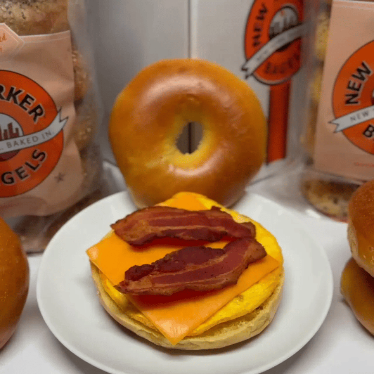 bacon egg and cheese on an egg bagel