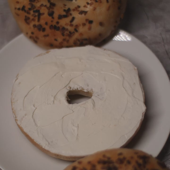 onion bagel with cream cheese