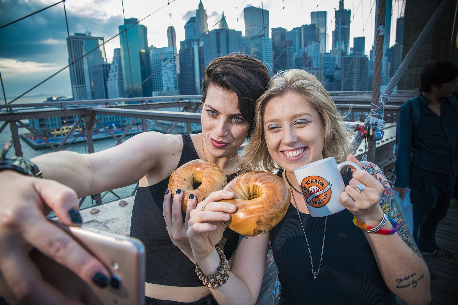 women eating new york bagels