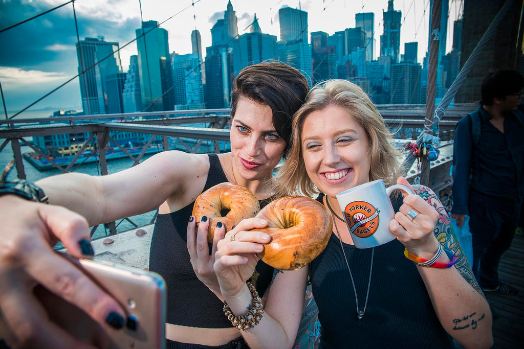women eating new york bagels