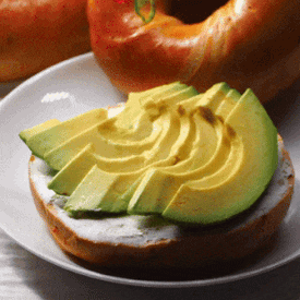 jalapeno bagel with cream cheese and fresh avocado